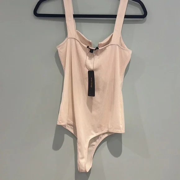 Bodysuit, never worn. - Picture 2 of 3